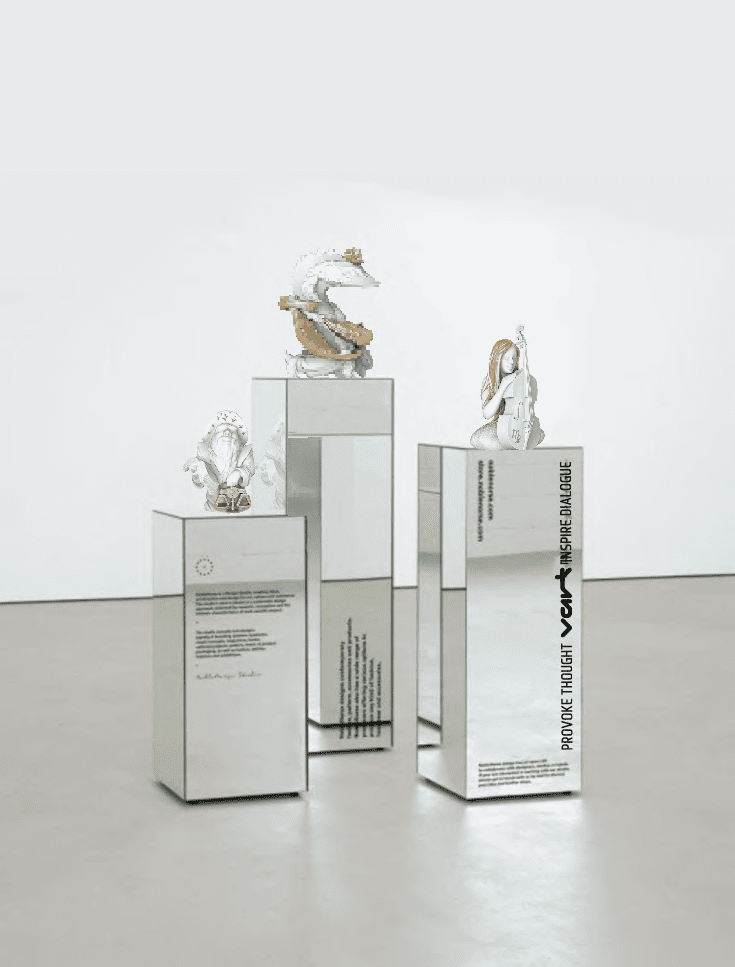 Statuette on green pedestal